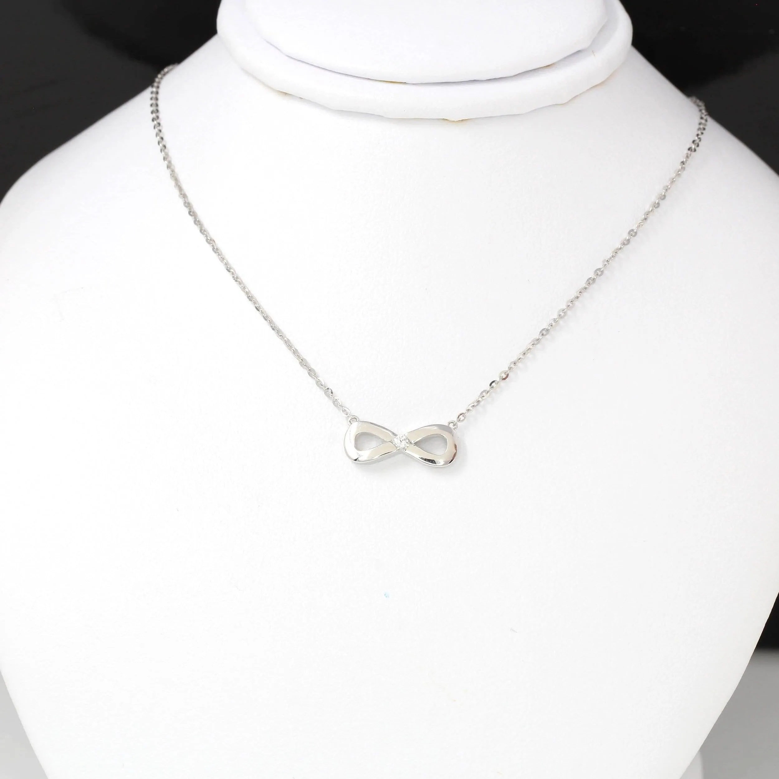 18K White Gold Infinity .03 CTW Diamond Pendant Necklace