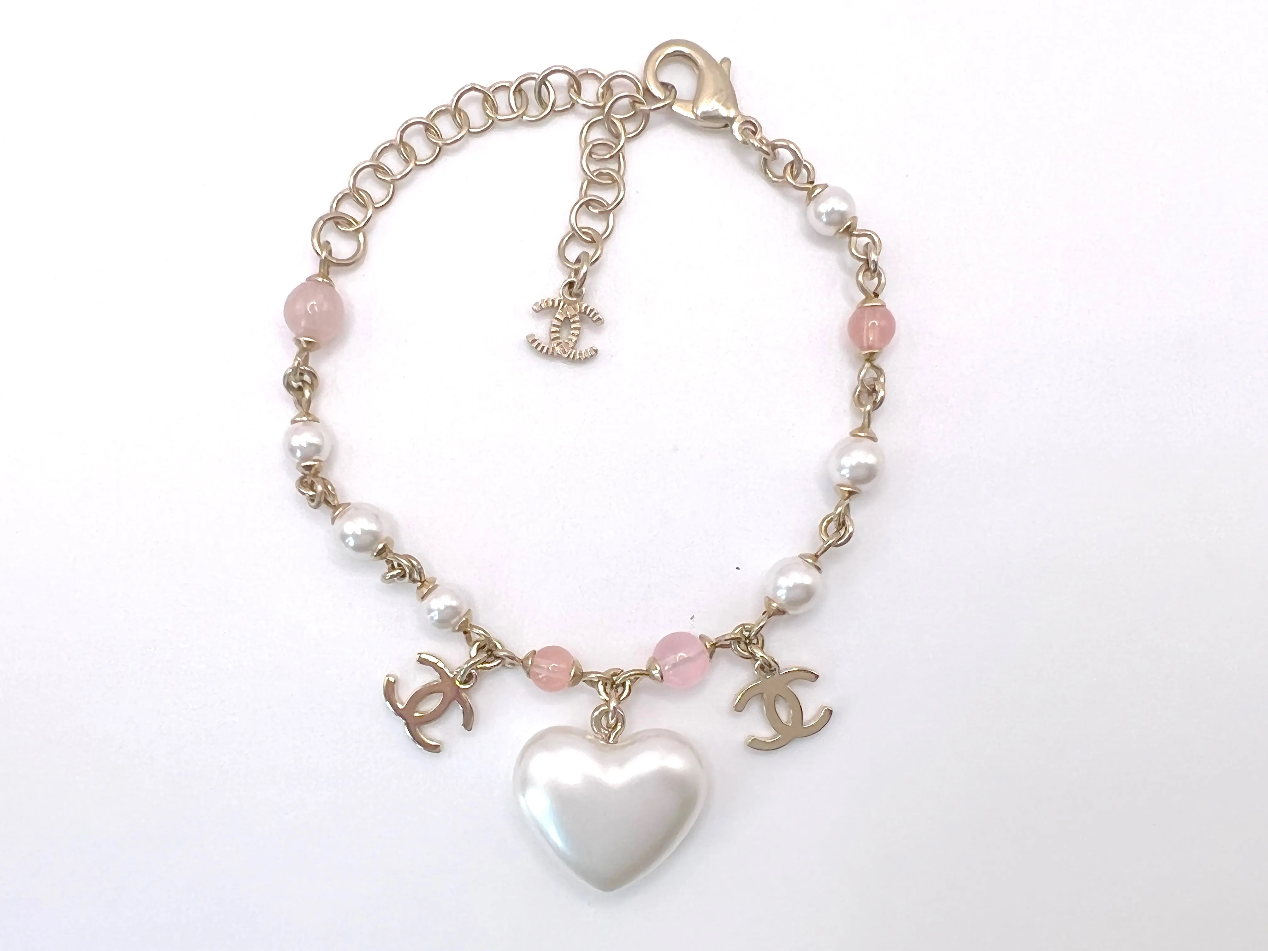 Chanel 21A Coco Neige Pearl Heart and CC Charm Bracelet