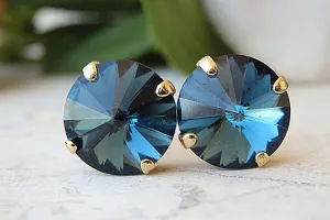 Navy blue stud earrings.