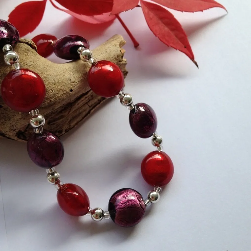 Necklace with red and dark amethyst Murano glass small lentil beads on silver