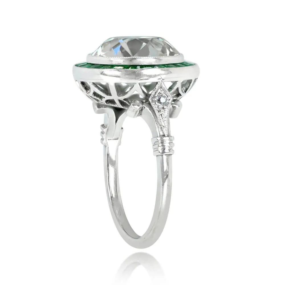 Platinum European cut Diamond and Emerald Halo set Ring