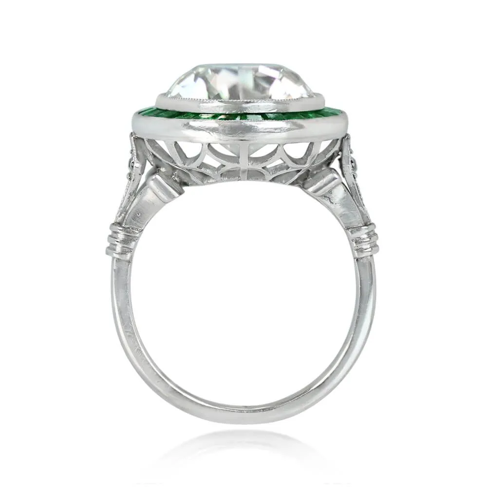 Platinum European cut Diamond and Emerald Halo set Ring