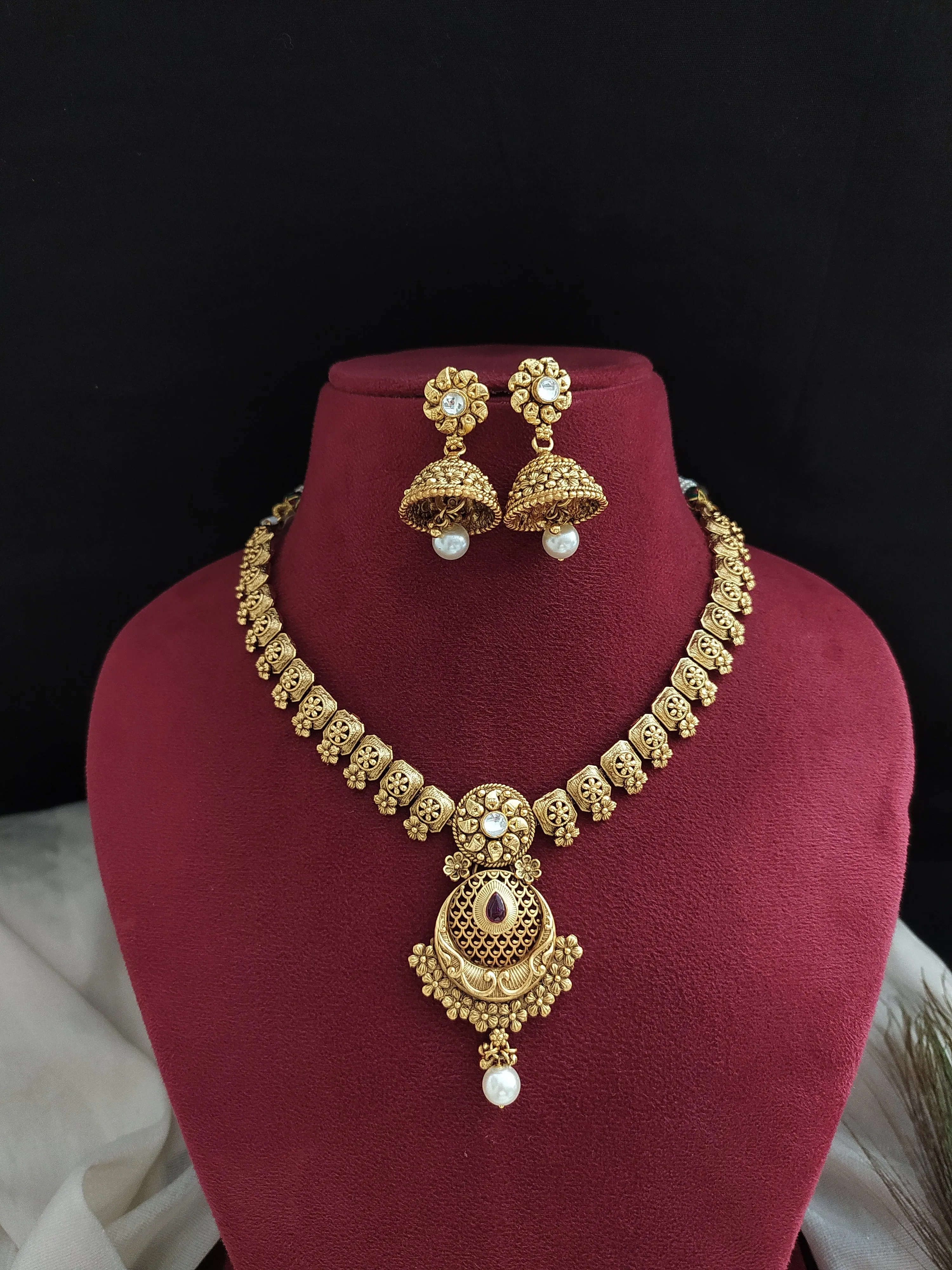 "Antique Plain Gold Replica Necklace with Jhumki - Ruby and White Stone Accents"