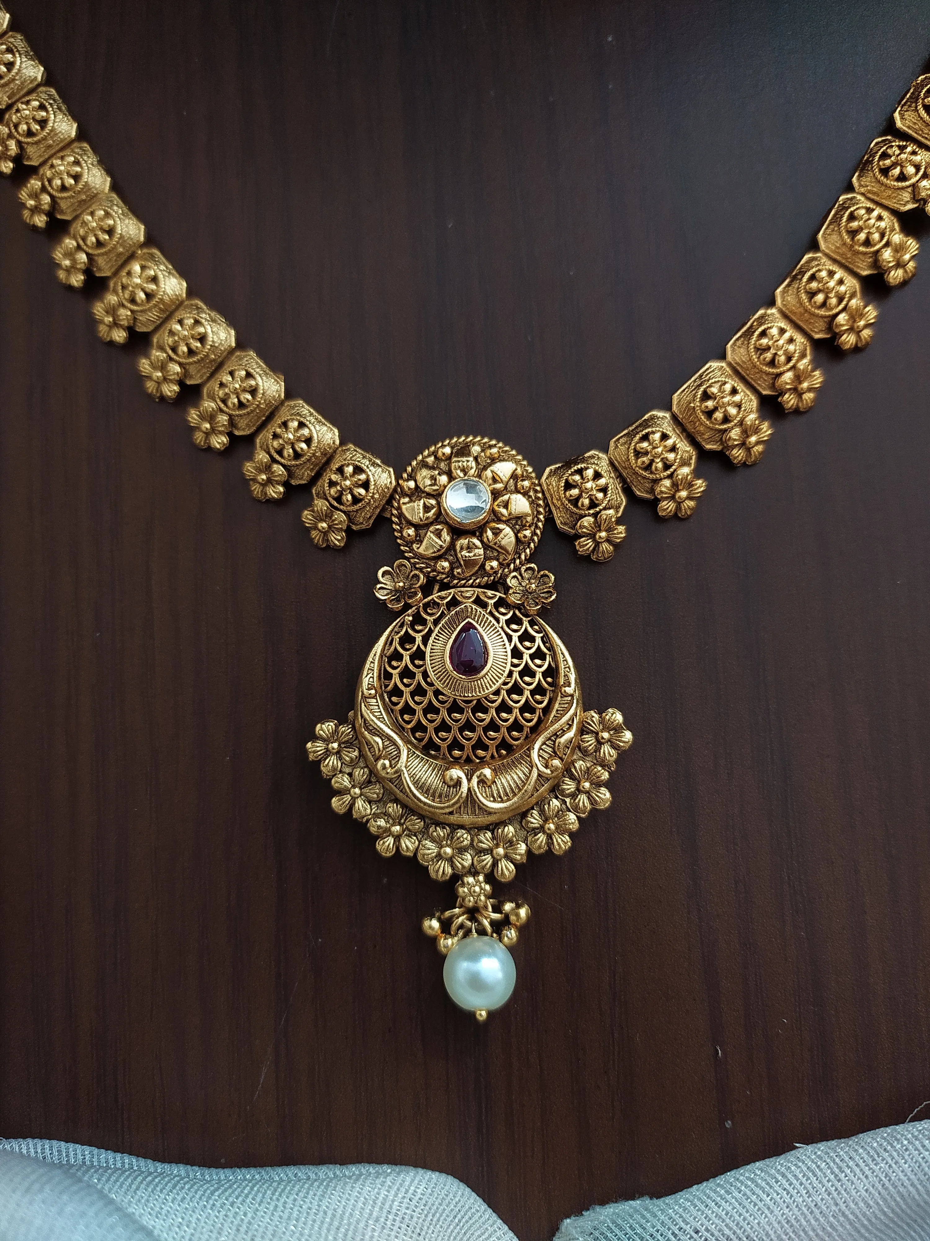 "Antique Plain Gold Replica Necklace with Jhumki - Ruby and White Stone Accents"