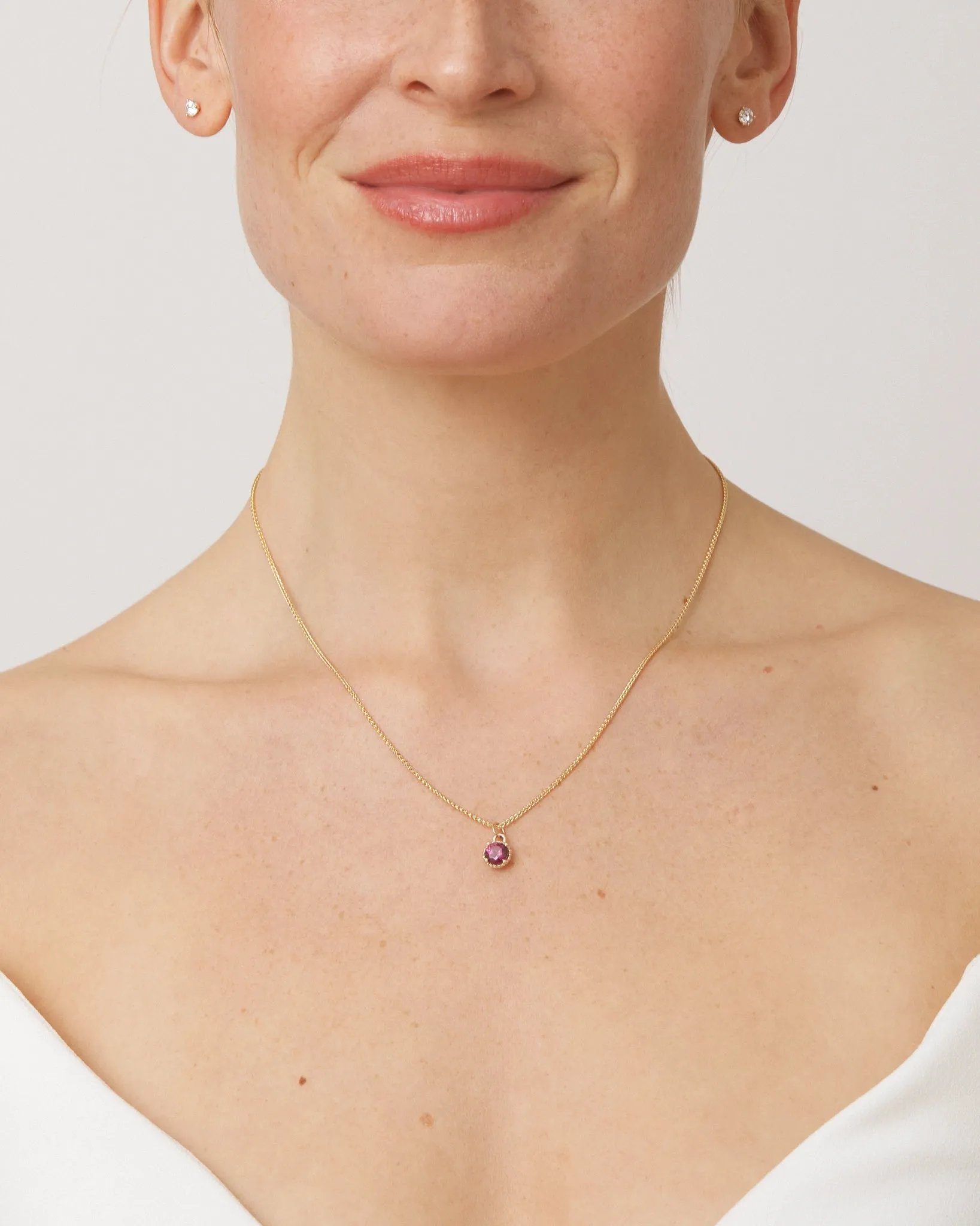 Round Galatée Pendant in 14k Yellow Gold with rasperry-toned Tanzanian Moyo Garnet