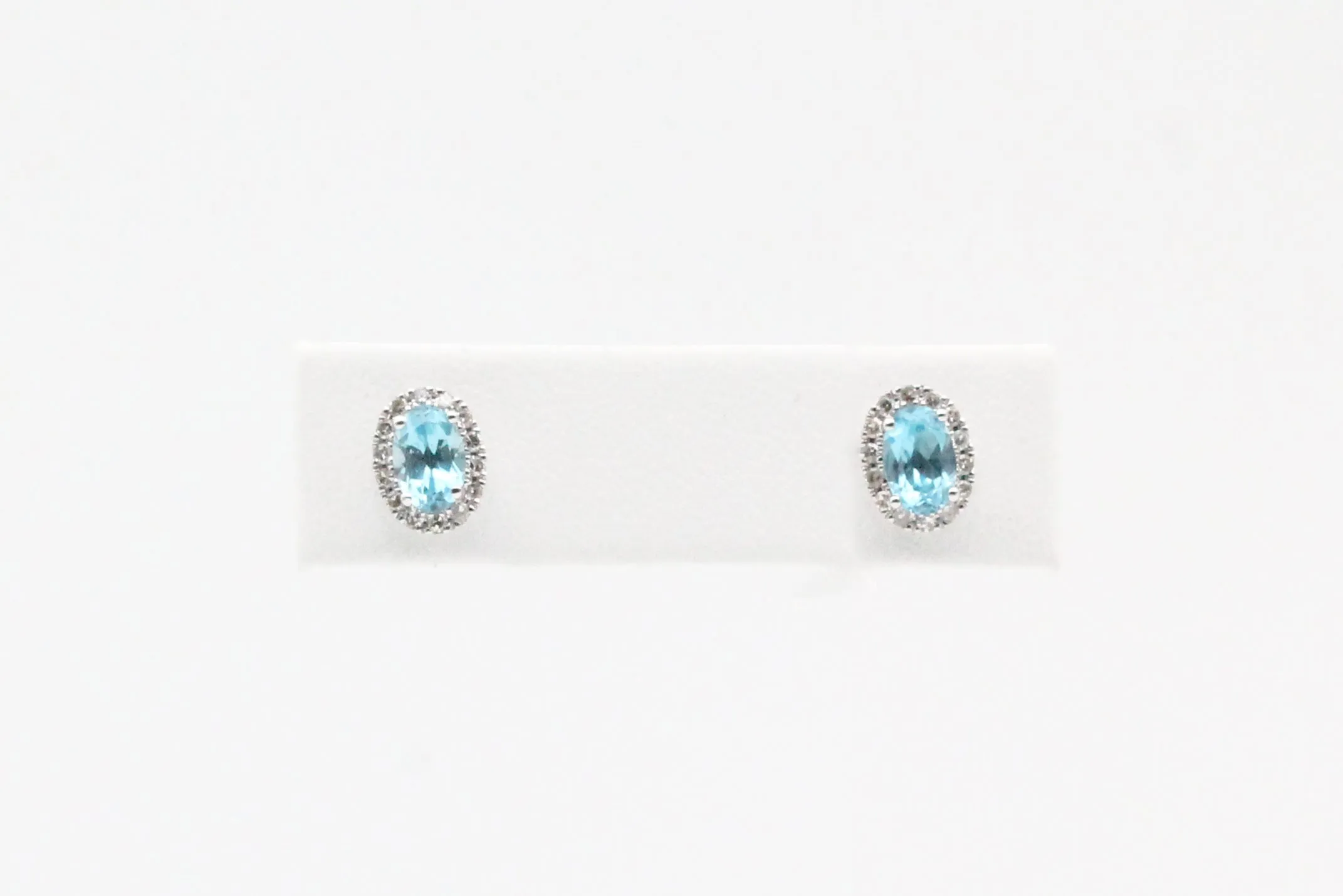 White Gold Blue Topaz and Diamond Halo Earrings